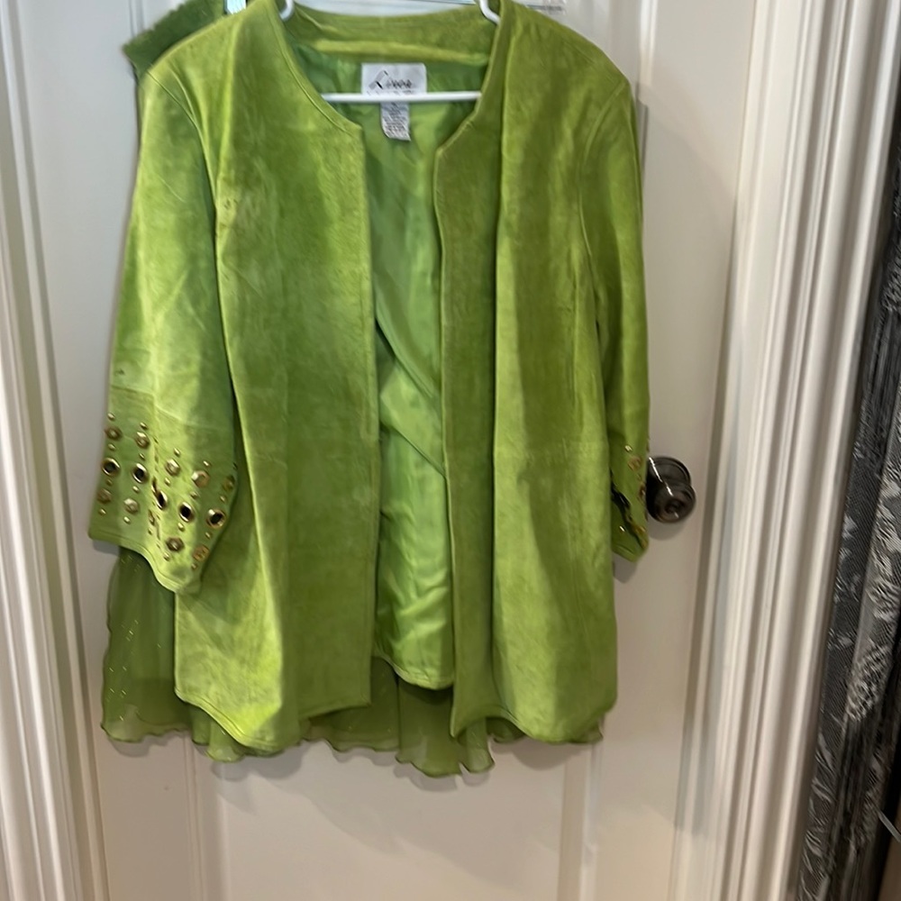 Suede jacket suit with chiffon skirt designed by Louis Dell olio
